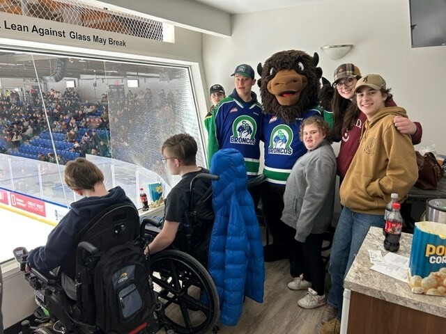 Group of Students at a hockey game